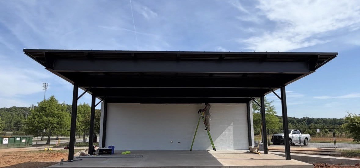 Black steel canopy being finished on site